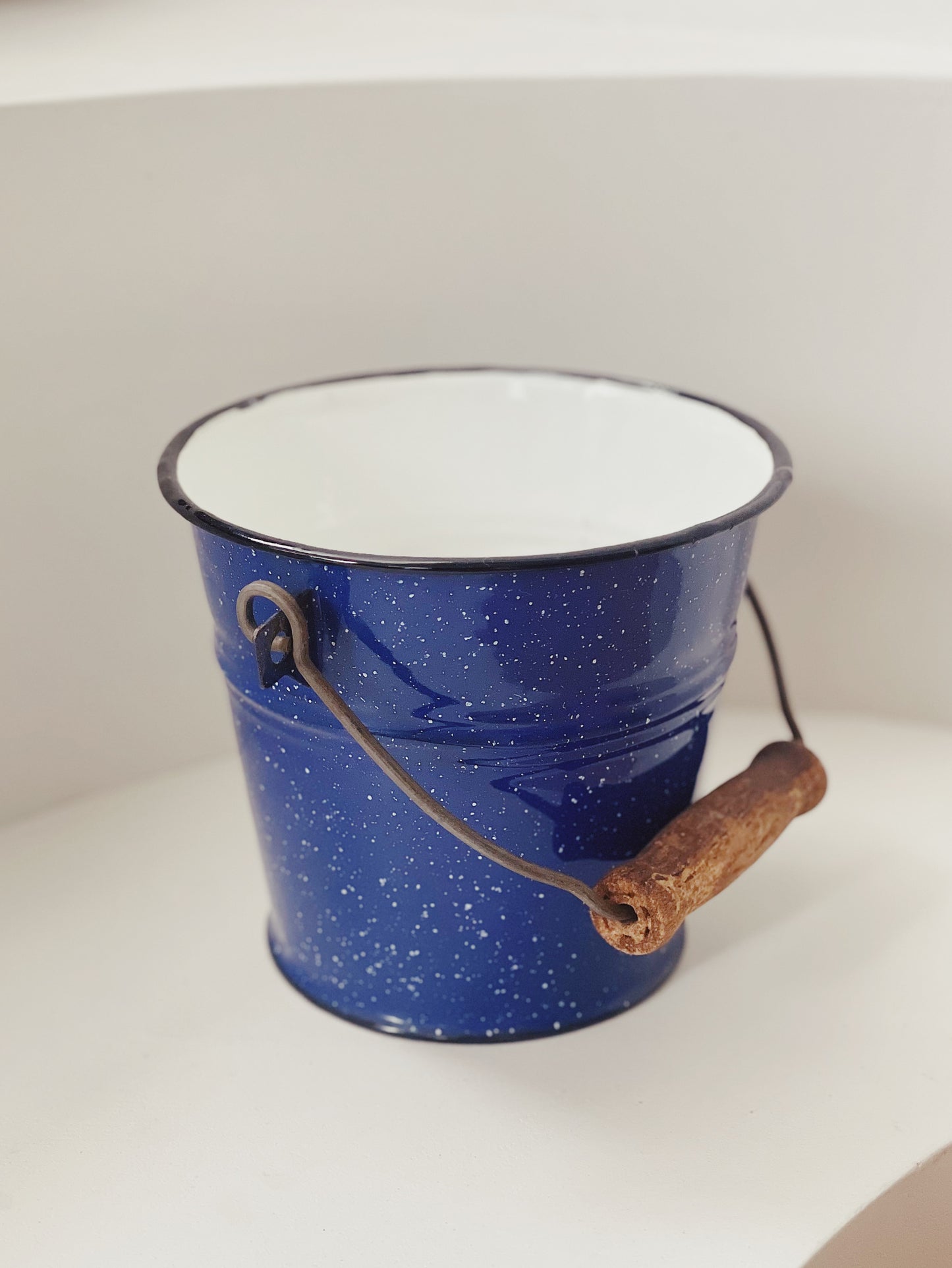 vintage blue and white enamel bucket